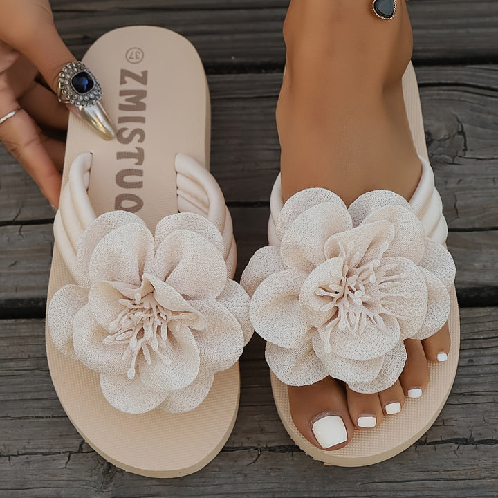 Group of assorted floral women's slippers, different colors & patterns, front studio shot, comfortable