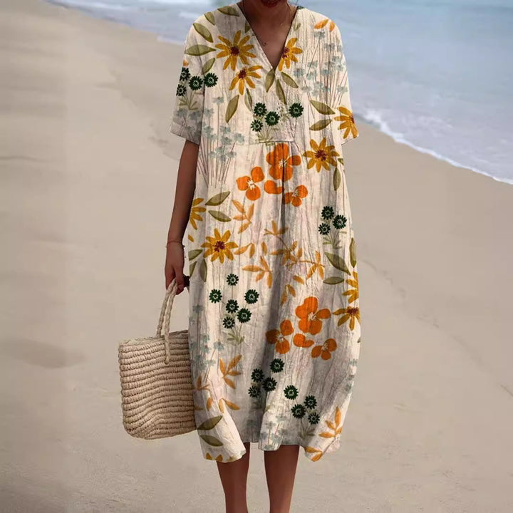 Breezy women's floral V-neck summer dress. Enjoy the comfort and light feel for any warm weather occasion.