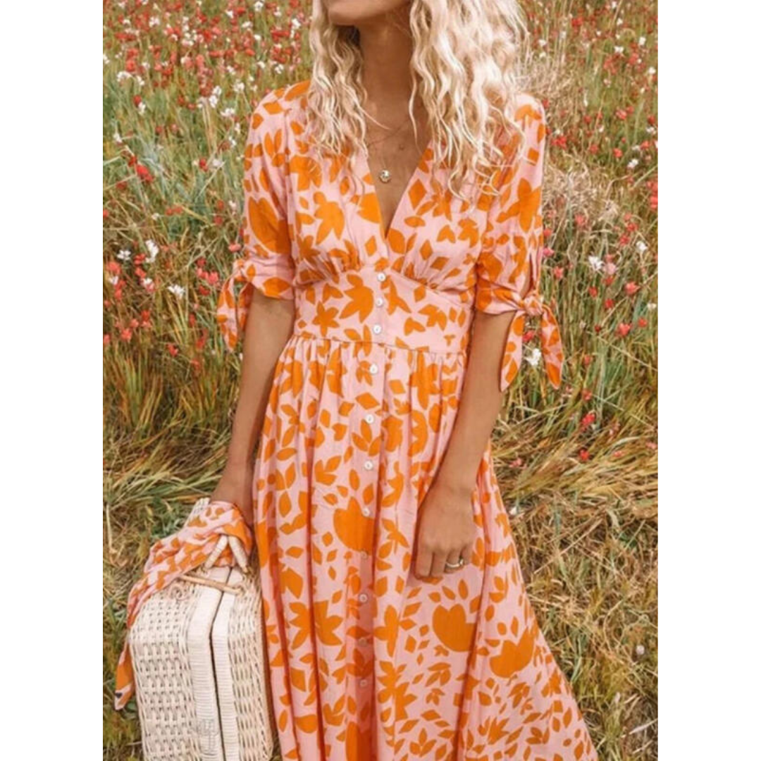 Women's flowing V-neck maxi dress with stylish tie sleeves, perfect for summer casual or elegant vacation wear.