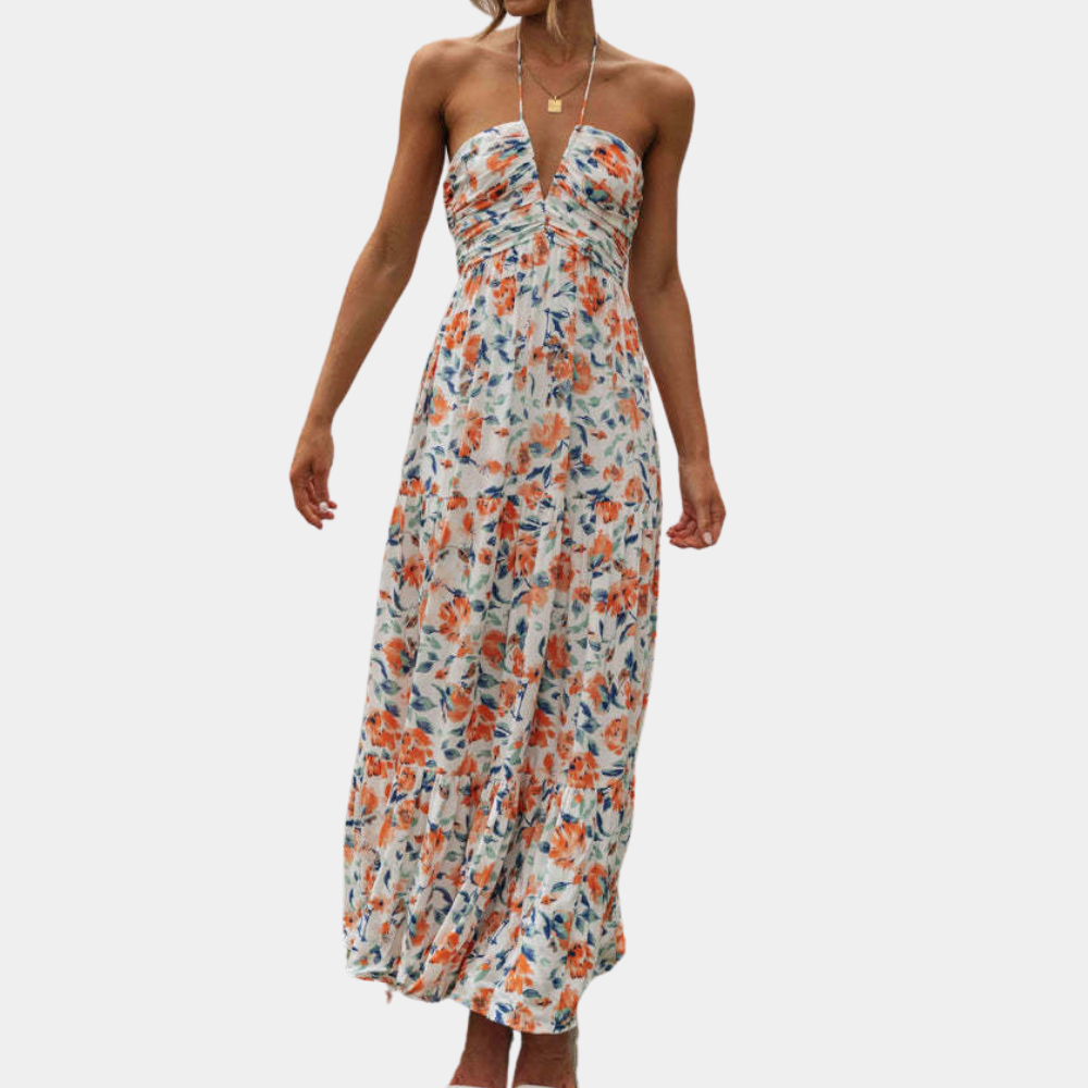Women's long summer dress with a comfortable halter neck and a beautiful flowing fabric.