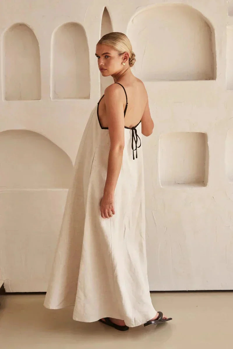 Elegant sleeveless beige boho maxi dress for women, featuring a comfortable flowy linen-look fabric.