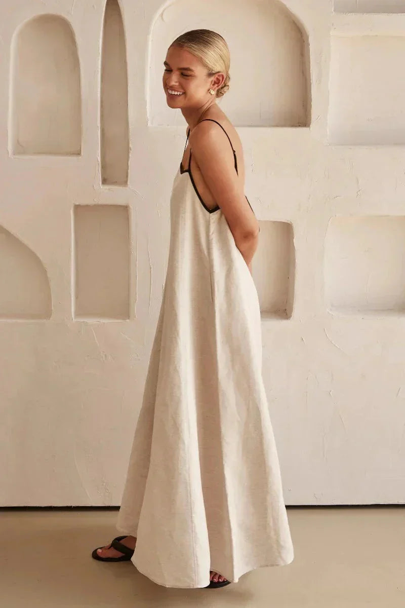 Women's Elin sleeveless beige maxi dress with a relaxed boho style, ideal for summer versatility.