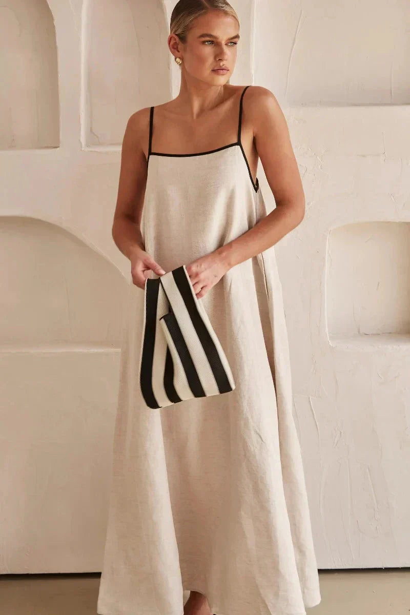 Versatile women's sleeveless beige boho maxi dress; a perfect long summer dress with a flowy design.