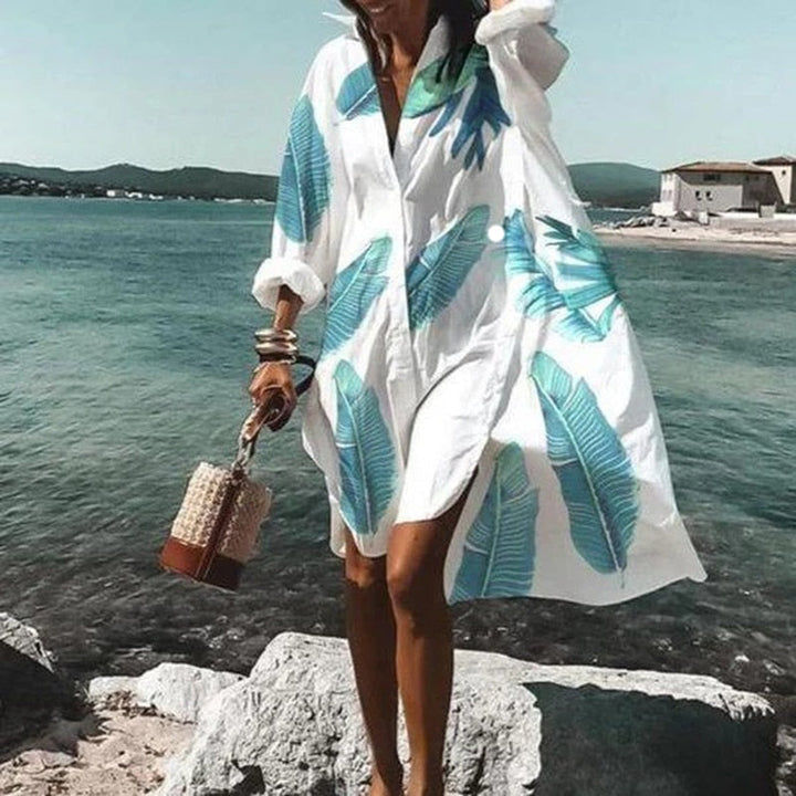 Comfortable & chic women's flowy summer dress. Versatile printed design for casual wear or holiday style.