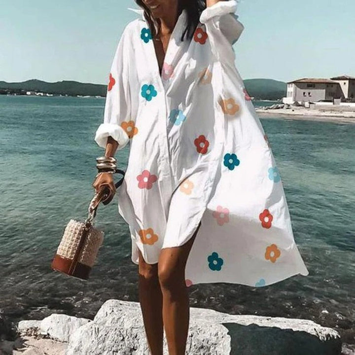 Elegant printed women's flowy summer dress. Casual chic style, perfect for sunny days, holidays & comfort.