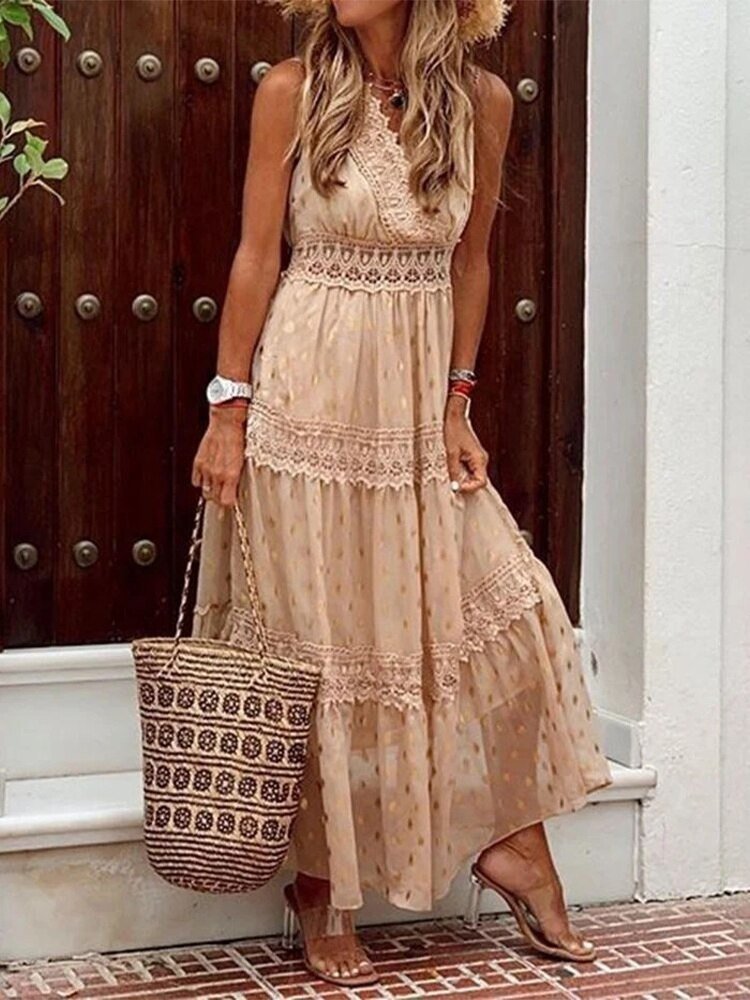 Women's flowy V-neck boho summer dress in a vibrant print, perfect for beach vacations or casual spring style.