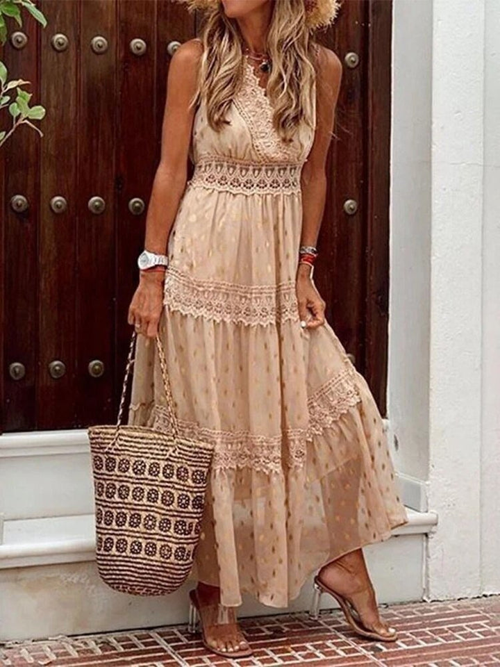 Women's flowy V-neck boho summer dress in a vibrant print, perfect for beach vacations or casual spring style.