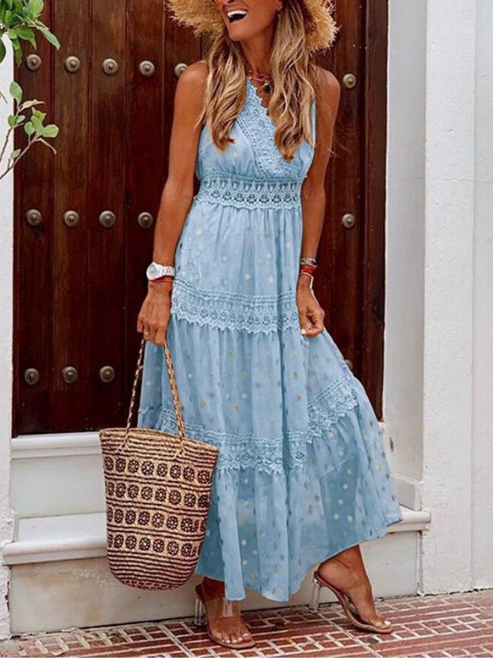 Full-length view of a women's flowy boho maxi dress with a V-neck, showcasing its effortless style for summer & spring.
