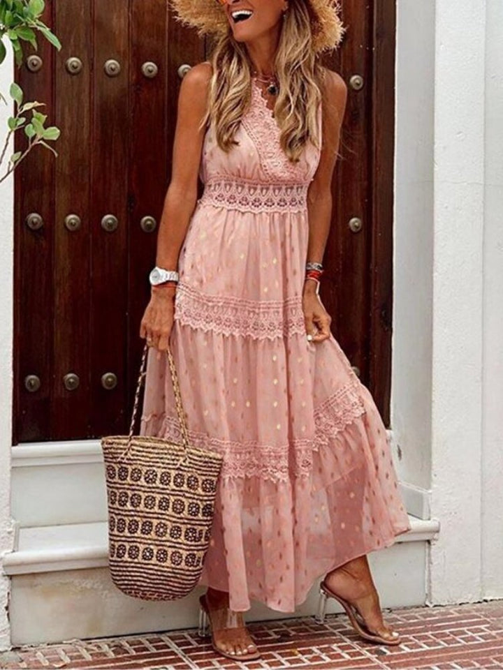 Chic women's V-neck boho summer dress, capturing the relaxed Ibiza style; perfect flowy maxi for vacations or spring.