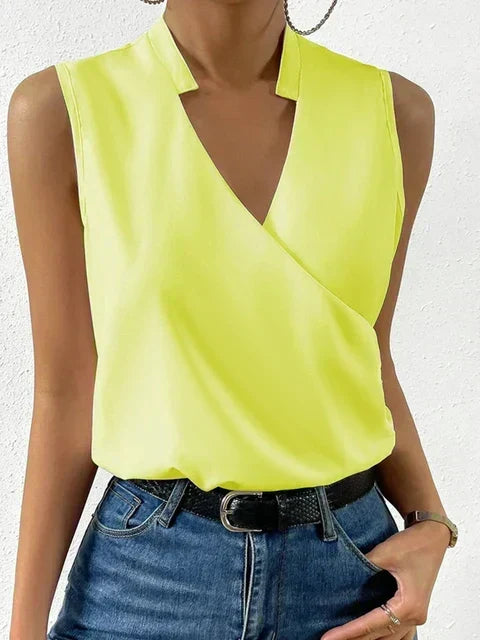 Elegant women's V-neck blouse, flowy fabric & short sleeves create a stylish, comfortable summer look.