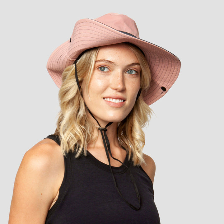 Ponytail opening women's sun hat, foldable, UPF 50+ UV protection, wide brim for beach & outdoor use.