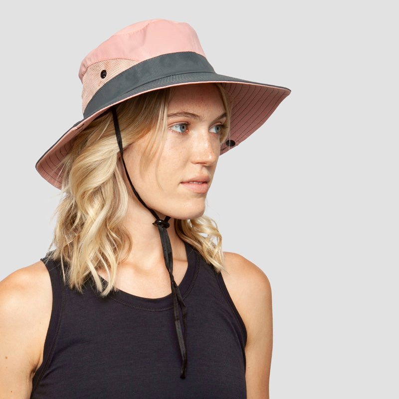 UPF 50+ breathable women's sun hat, foldable wide brim for beach, travel, & outdoor UV protection.