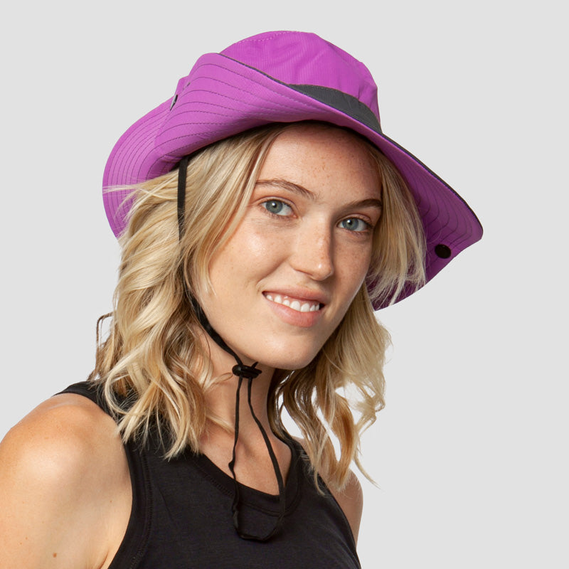 Wide brim women's sun hat, foldable & breathable, offering UPF 50+ UV protection for all summer adventures.