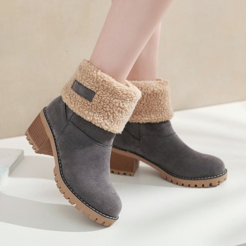 Elegant women's FrostStep winter ankle boots with a sturdy heel. Insulated for ultimate warmth in cold weather.