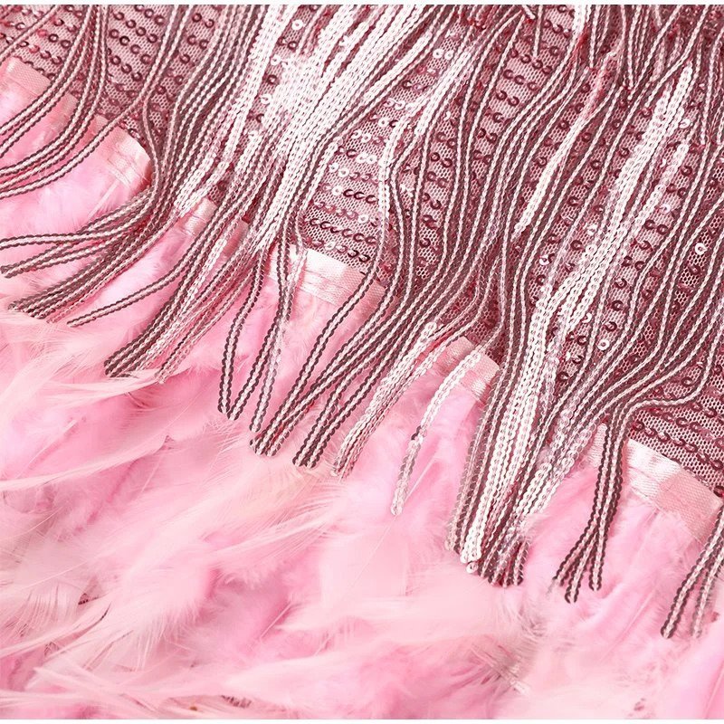 Chic women's sequin & feather cocktail dress; a stunning choice for any special occasion.