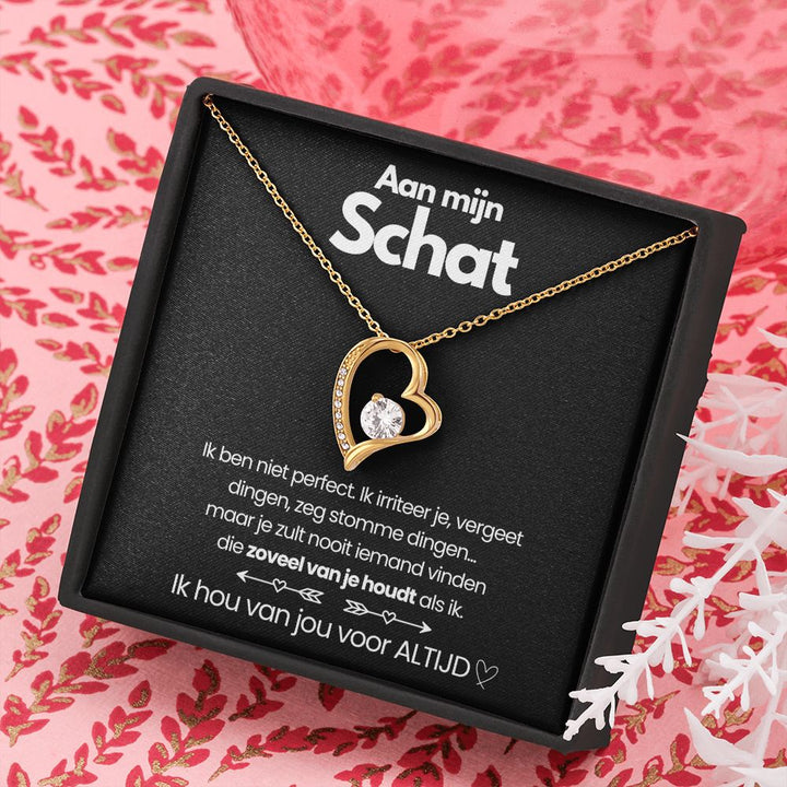 Women's gold necklace featuring a brilliant heart zirconia pendant. A lovely jewelry gift.