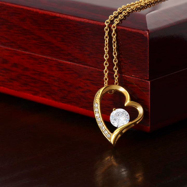 Special occasion gold finish heart zirconia pendant necklace. Beautiful women's jewelry gift.
