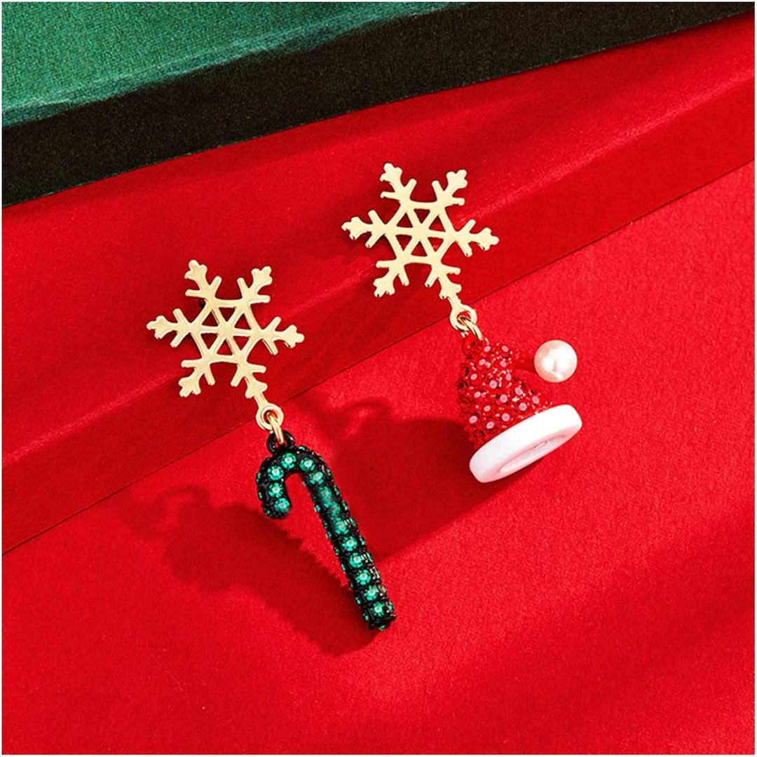 Sparkling women's snowflake earrings, gold-plated for Christmas festivities. Elegant holiday jewelry for her.