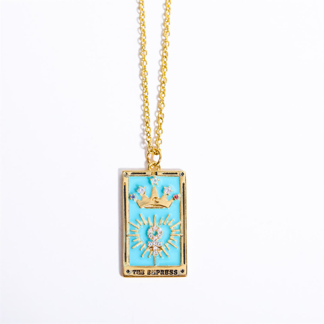 Mystical gold-plated tarot card necklace, a unique spiritual accessory for women.