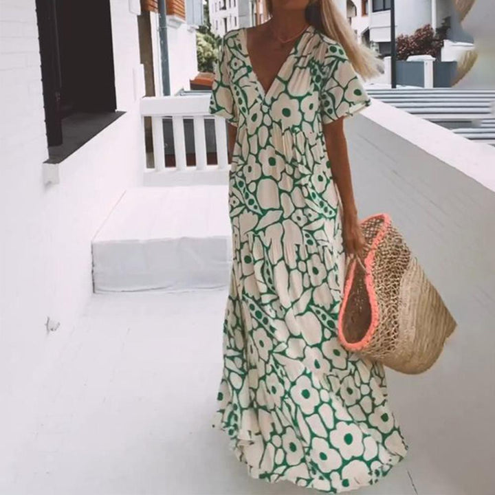 Women's green floral maxi dress with short sleeves & V-neck. Perfect for summer casual or party wear.