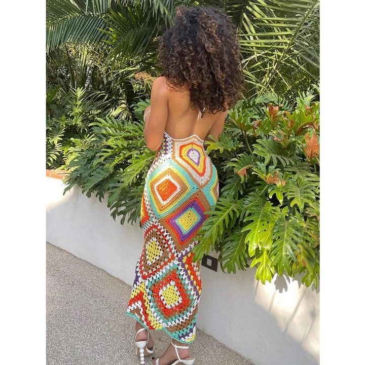 Flowy crocheted long beach dress for women. Ideal summer vacation resort wear or unique boho style cover-up.