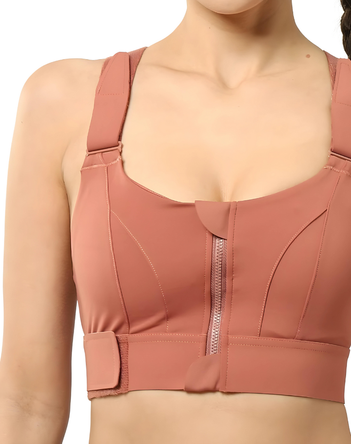Detail of adjustable shoulder straps on a women's high support running bra, ensuring a customized fit.