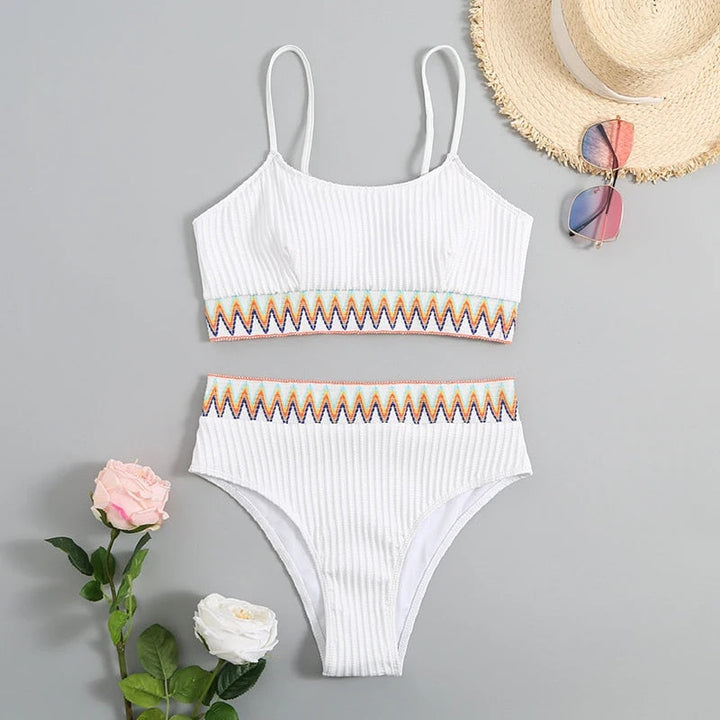 Women's fashionable high waist bikini with adjustable straps. A stylish two-piece swimsuit for ultimate summer comfort.