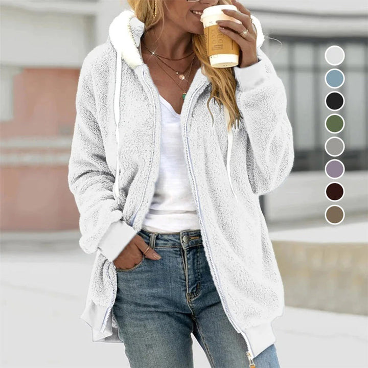 Women's stylish hooded vest, offering cozy comfort, warmth, and a versatile layer for any season.