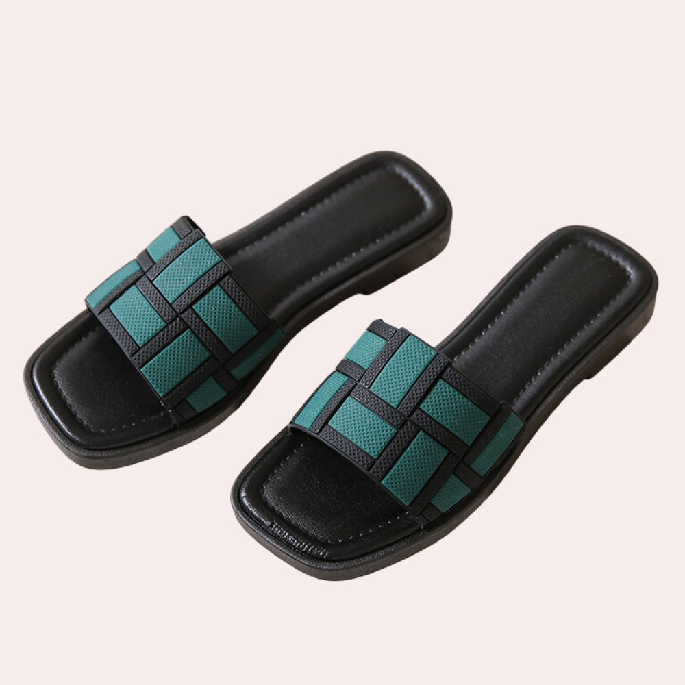 Adjustable Isla flat sandals for women, providing comfortable and chic footwear for daily activities.
