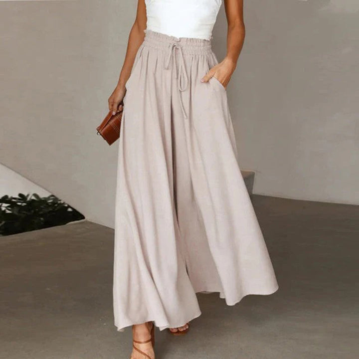 Women's Isla high waist wide leg trousers. A comfortable, flowing silhouette for modern casual fashion.