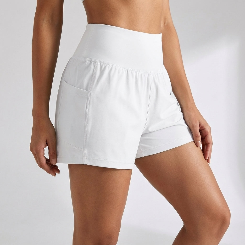 Elastic waistband detail on Ivy women's high-waist 2-in-1 training shorts with pockets.