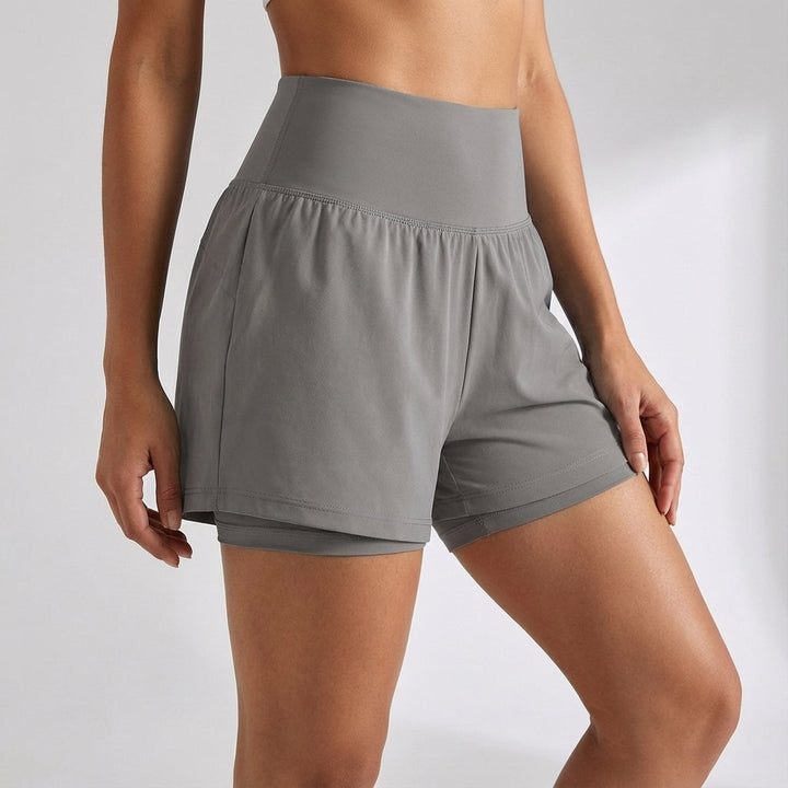 Breathable Ivy women's athletic shorts, 2-in-1 design for ultimate comfort and functionality.