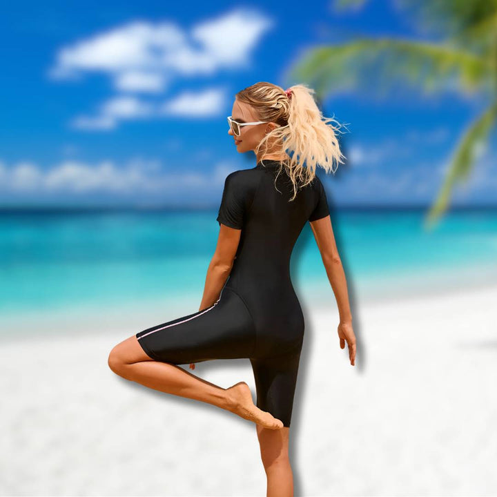 Durable Kaia women's shorty wetsuit, athletic outdoor gear for snorkeling, surfing, and water sports.