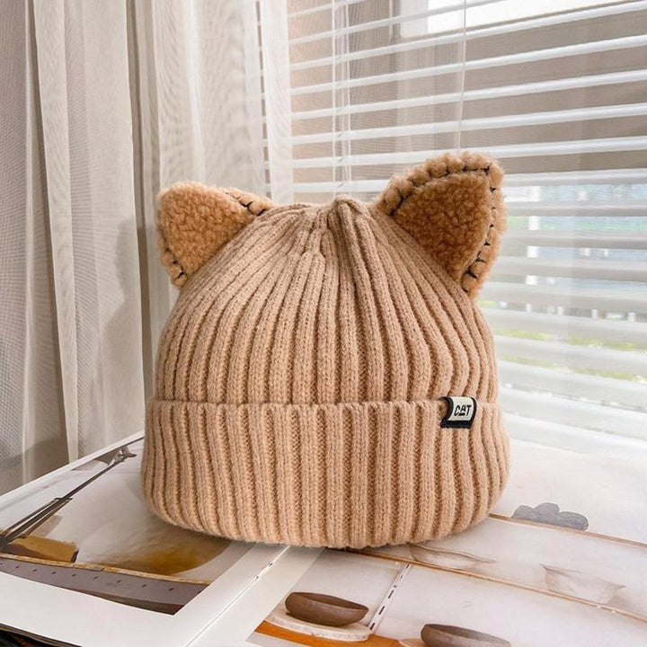 Warm women's cat ear knitted beanie, cozy winter accessory for ultimate comfort and style