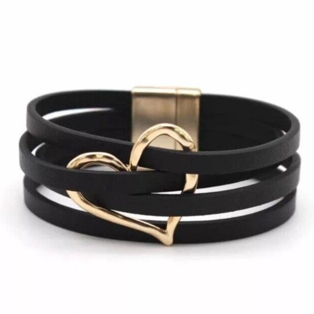 Elegant layered leather bracelet for women, multi-strand boho style with silver charm accent.