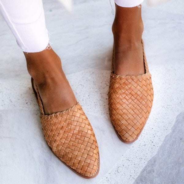 Versatile women's braided leather sandals, perfect for everyday summer wear and stylish comfort.