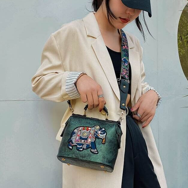 Mandala embroidered crossbody bag for women. Lightweight, multi-use, and bohemian aesthetic.