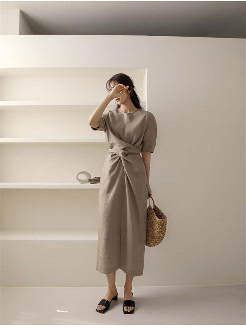 Simple khaki summer dress for women, a versatile midi style with an adjustable waist for all body types.