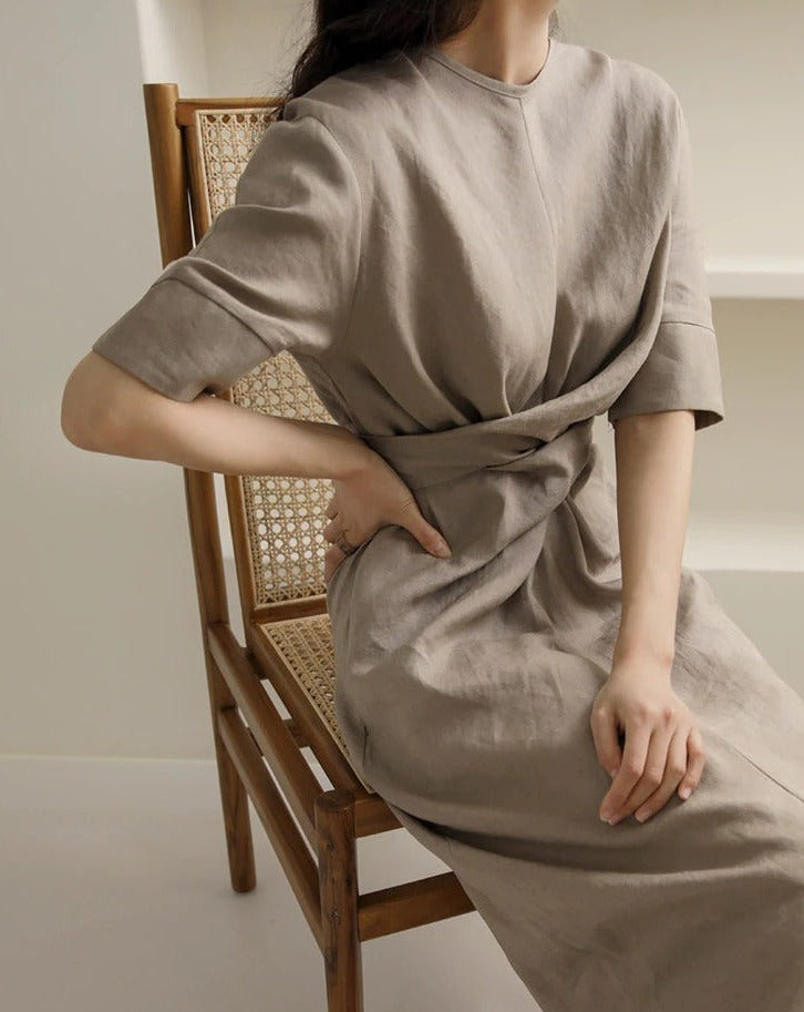 Relaxed khaki summer midi dress for women, perfect vacation wear with an adjustable waist for comfort.