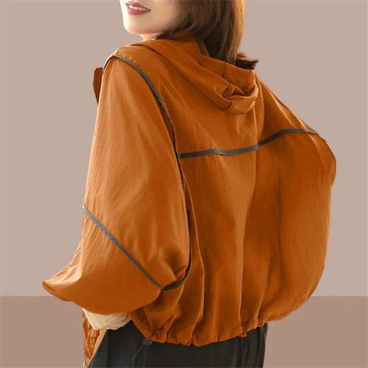 Women's lightweight oversized summer hoodie jacket in light fabric, perfect for casual spring and summer layering.