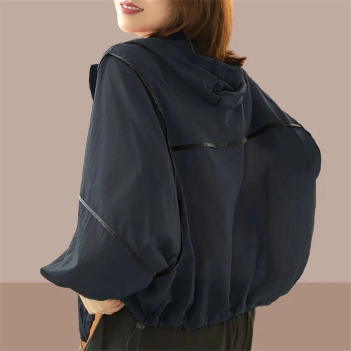 Comfortable women's oversized summer hoodie jacket with a relaxed fit, ideal for everyday casual wear and versatile styling.
