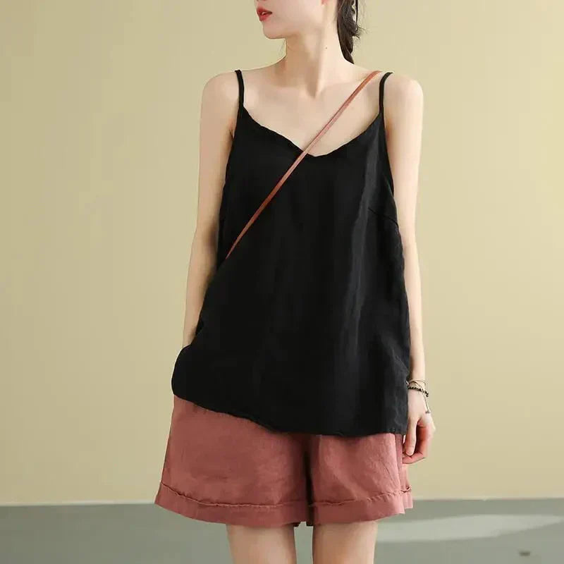 Breathable women's basic sleeveless tank top. Ideal lightweight summer shirt for casual or active ladies.