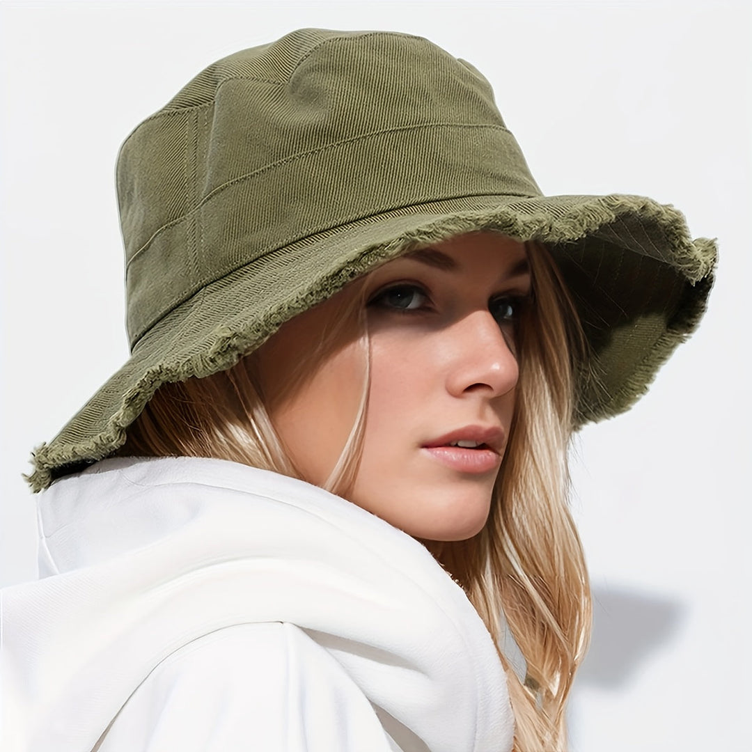 White foldable summer bucket hat for women, with drawstring, great for sun protection & travel. Lightweight design.
