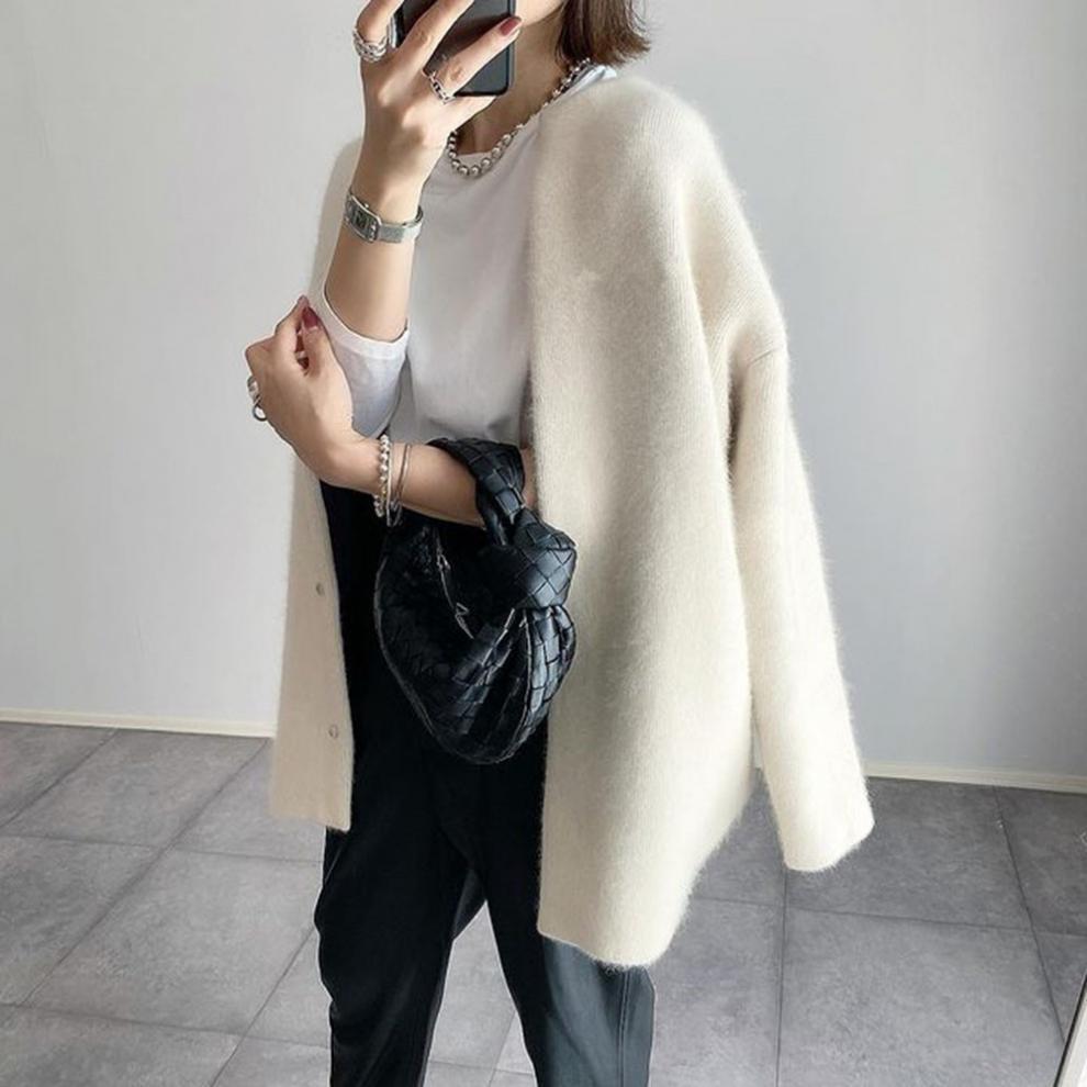 Women's lightweight summer vest cardigan, perfect for warm weather layering and effortless style.