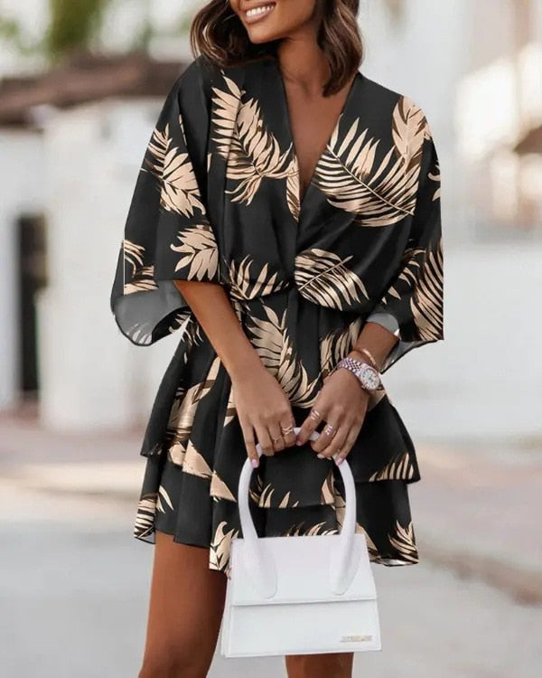 Elegant yet casual V-neck mini dress for women, ideal for a chic summer look.