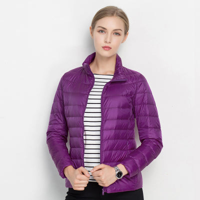 Puffer style women's lightweight waterproof coat, offering warmth without bulk.