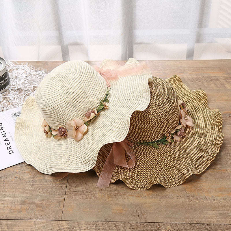 Women's Liora summer hat with vibrant floral pattern, perfect for sun protection and beach fashion