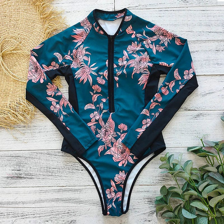 Active women's long sleeve one-piece swimwear with front zip, quick dry fabric.