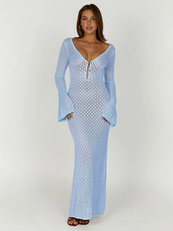 Stylish women's white long beach dress, V-neck, back cutout, and flowy design for ultimate summer comfort.
