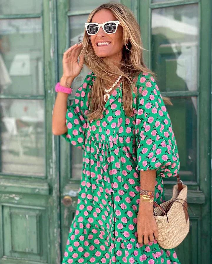 Elegant women's flowy boho summer dress, Ibiza style for beach or vacation. Loose fit ensures all-day comfort.